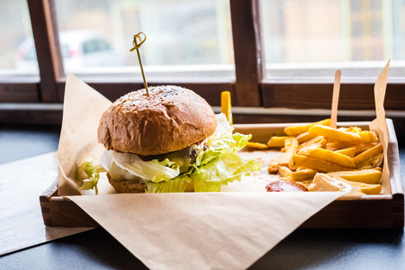 classic hamburger and french fries - unhealthy but tasty foodの写真素材