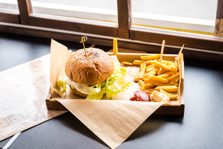 classic hamburger and french fries - unhealthy but tasty foodの写真素材