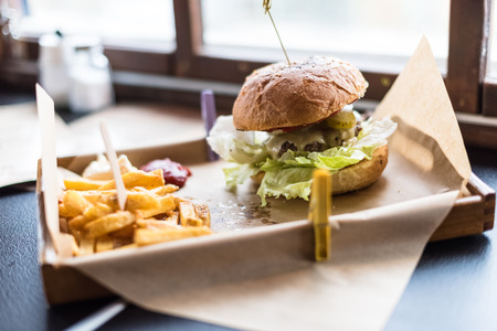 classic hamburger and french fries - unhealthy but tasty foodの写真素材