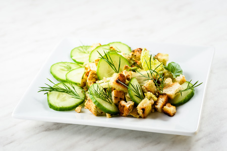Salad with chicken, avocado and croutonsの写真素材