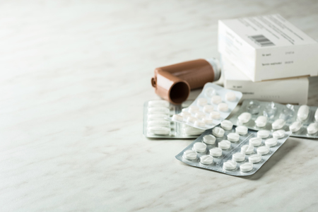 medicine blister on kitchen tableの写真素材