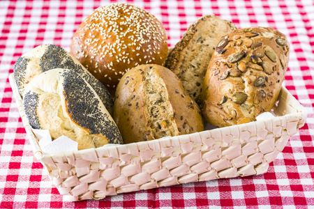 Buns with different grains, sesame, poppy seeds, pumpkin seedsの写真素材