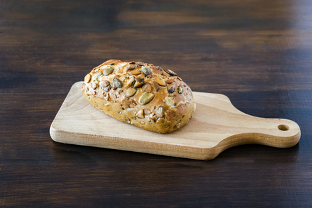 Buns with different grains, sesame, poppy seeds, pumpkin seedsの写真素材