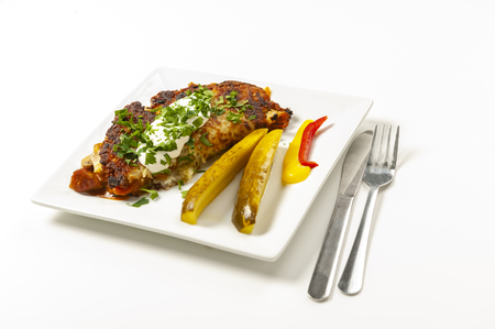 potato pie served with pork stew with mushroomsの写真素材