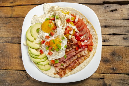 Huevos rancheros - eggs in the ranch - solid breakfasts in Mexicanの写真素材