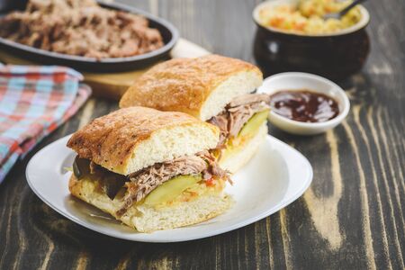 sandwich with pulled pork and sauerkraut - variants with different breads