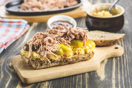 sandwich with pulled pork and sauerkraut - variants with different breadsの写真素材