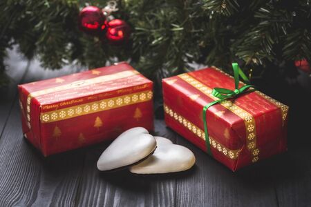 Christmas sweets - gingerbread cookies covered with icing and chocolateの写真素材