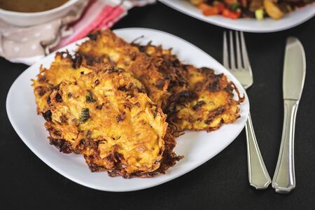 potato pancakes on white plateの写真素材