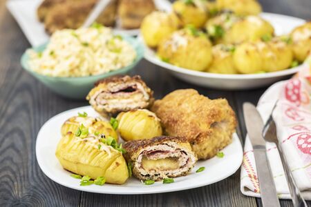 cutlet cordon bleu and hasselback potatoes - a simple and tasty dishの写真素材