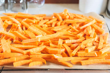 Sweet potato fries before placing in the ovenの写真素材