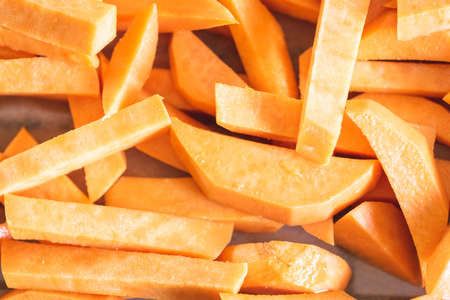Sweet potato fries before placing in the ovenの写真素材