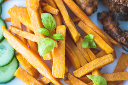 Sweet potato fries and chicken tenderloinの写真素材