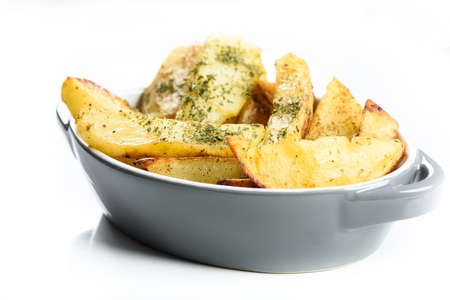 Hawaiian cutlet with baked potatoes and a bouquet of saladsの写真素材