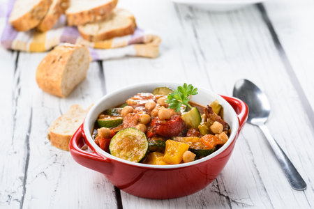 Spanish cauldron - stew with chickpeas, zucchini and chorizo sausageの写真素材