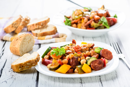 Spanish cauldron - stew with chickpeas, zucchini and chorizo sausageの写真素材