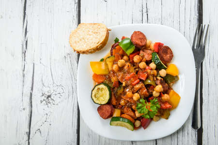 Spanish cauldron - stew with chickpeas, zucchini and chorizo sausageの写真素材