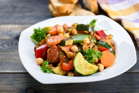 Spanish cauldron - stew with chickpeas, zucchini and chorizo sausageの写真素材