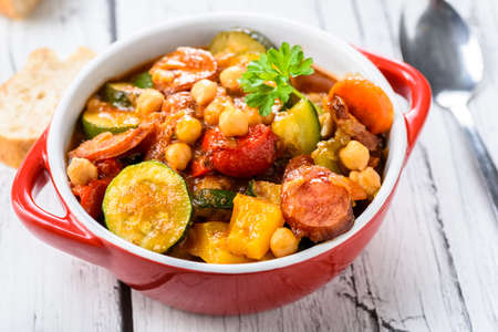 Spanish cauldron - stew with chickpeas, zucchini and chorizo sausageの写真素材