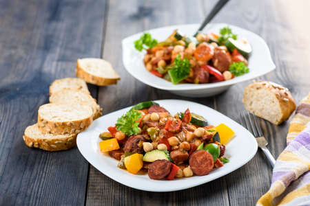 Spanish cauldron - stew with chickpeas, zucchini and chorizo sausageの写真素材