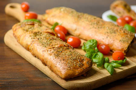 Pizza stromboli on a wooden backgroundの写真素材