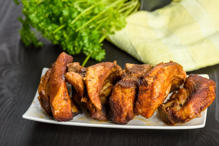 Ribs in honey and Silesian dumplings served with beetroot and sauceの写真素材