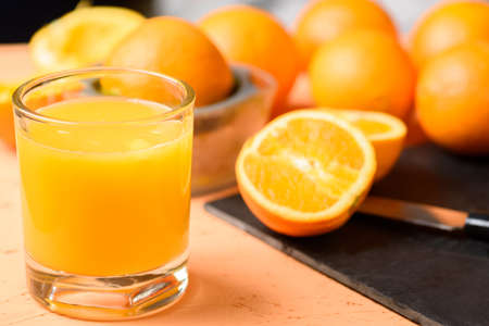 freshly squeezed orange juice tastes best in the morningの写真素材