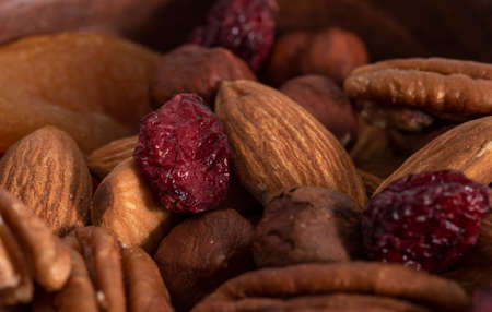 Mixed nuts and dry blueberry texture. Macro lens. protein source.の写真素材
