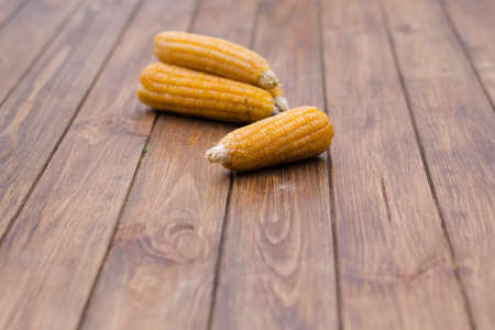 corn on the wooden backgroundの写真素材