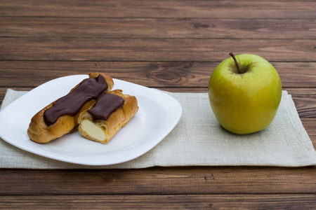 plate of chocolate cake and fresh applesの写真素材