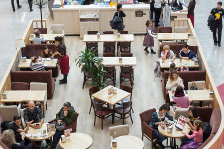 Several of the people, young people, women and mothers with children in cafe in shopping centerのeditorial素材