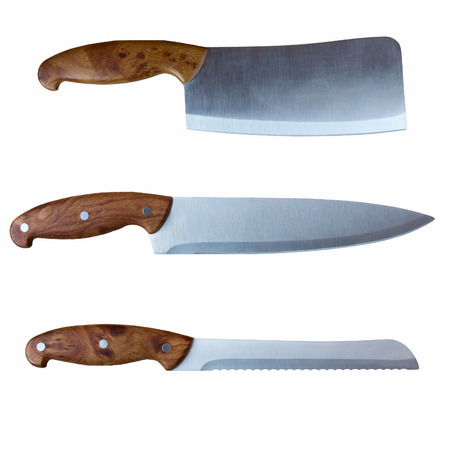 Kitchen ax and two kitchen knives with brown handles close-up on a white background. Flat layの写真素材