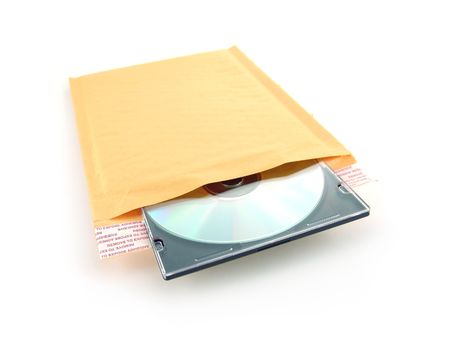 manilla bubble mailer with compact disc isolated on white