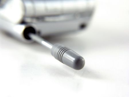 gray cellular phone antenna over white backgroundの写真素材