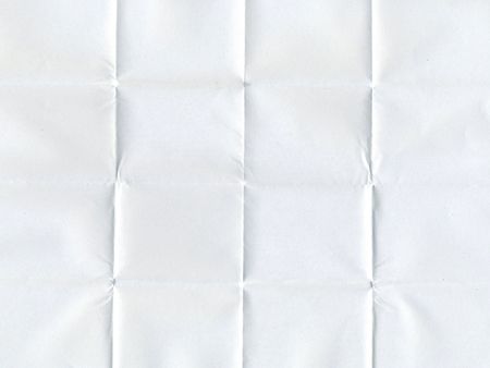 white piece of paper folded multiple times