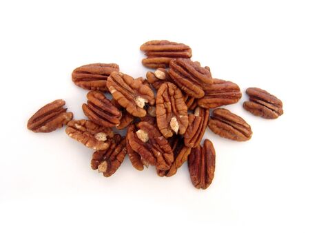 pile of walnuts isolated over white backgroundの写真素材