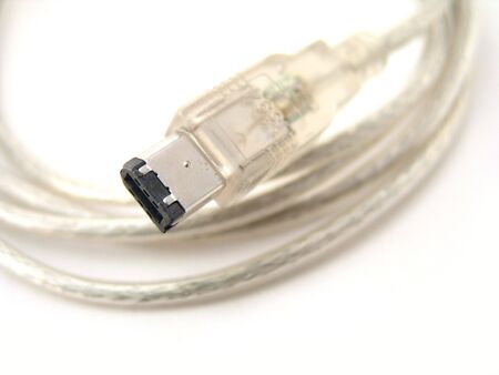 close-up of firewire cable isolated over white backgroundの写真素材