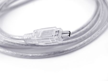 close-up of firewire cable isolated over white backgroundの写真素材