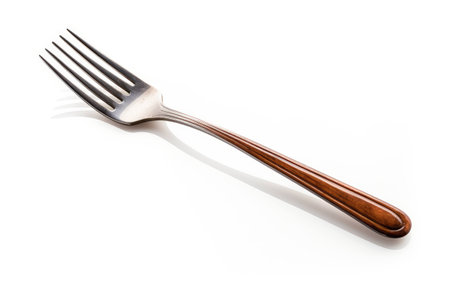 Elegant Cake Fork on White Background.の素材