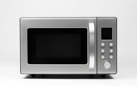 Efficient Microwave Appliance on White Background.の素材