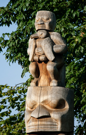 First Nations totem poles representing craftsmanship and unique culture of indigenous people.の写真素材