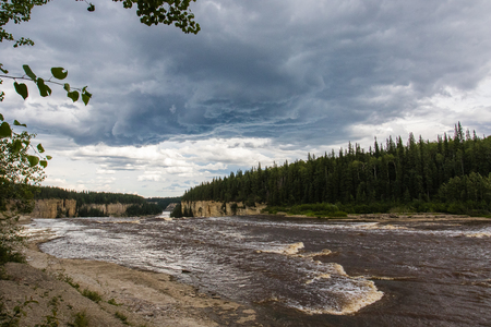 Alexandra Falls tumble 32 meters over the Hay River, Twin Falls Gorge Territorial Park Northwest territories, Canadaの写真素材