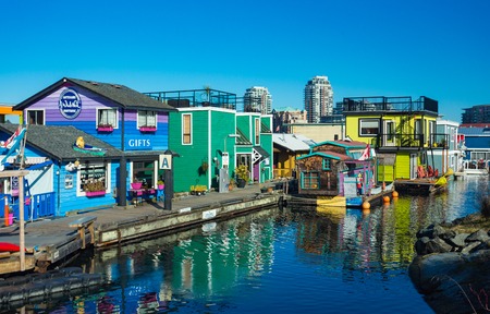 VICTORIA BC CANADA FEB 12, 2019: Victoria Inner Harbour, Fisherman Wharf is a hidden treasure area. With colorful floating homes, gifts, food and wildlife watching eco tours.のeditorial素材