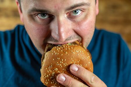 Man Enjoying Burgerの写真素材