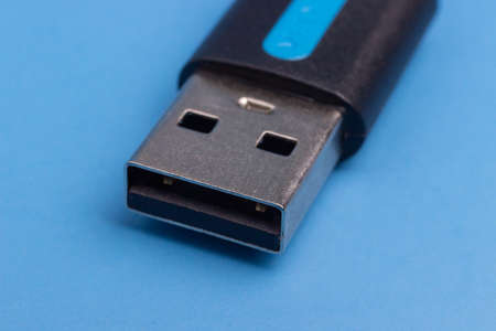 USB A isolated on Blue background, one of the first type of cableの写真素材