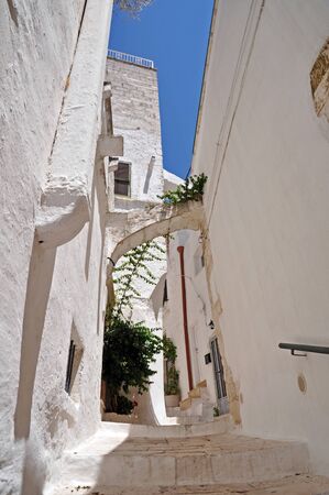 Ostuni lane in the Old Town (the White City), Puglia, Italyの写真素材