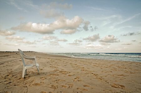 A wonderful tropical beach location with the contrast of abandoned garbageの写真素材