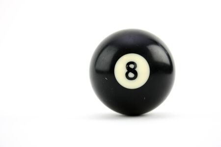 8 ball used in playing a game of billiards