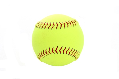 Yellow softball set on a white backgroundの写真素材
