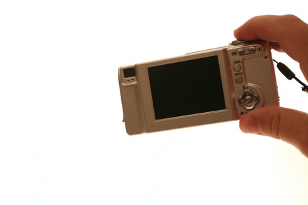 Digital Camera Set on White Background